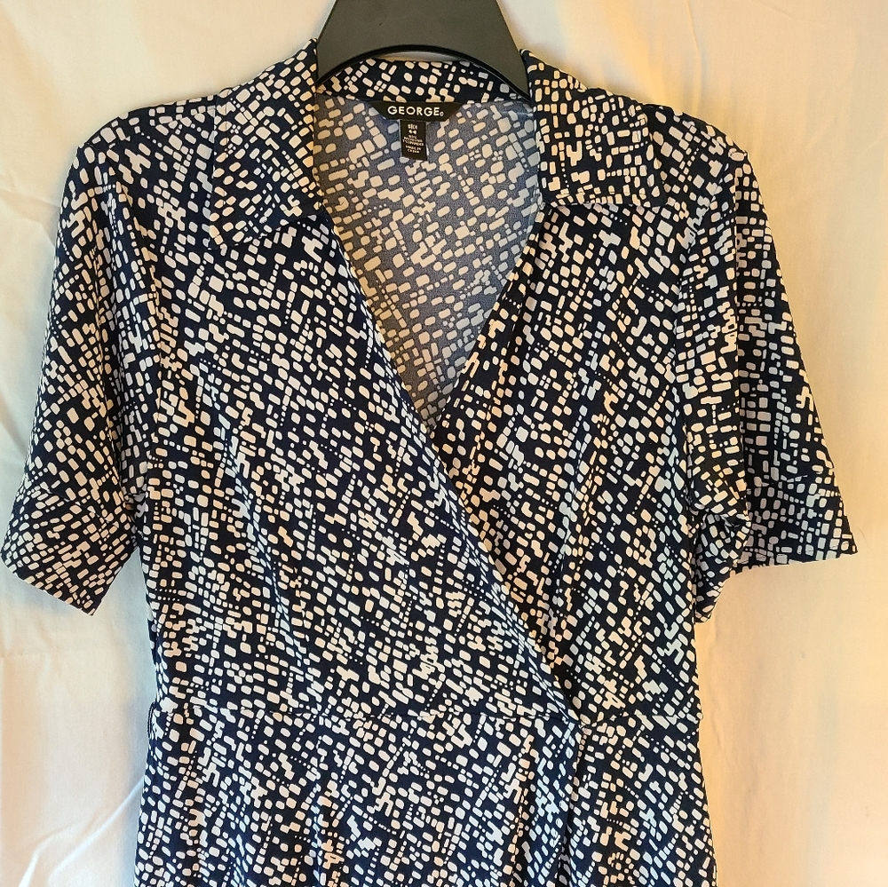 Navy blue and white wrap dress